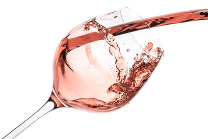 rose wine splashing on white background